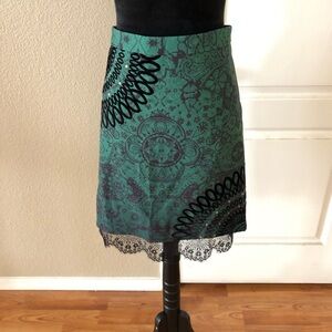 Green embellished skirt